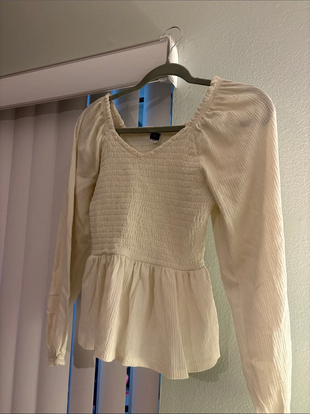 Old Navy Cream Smocked Peplum Long-Sleeve Top